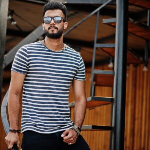 Arabian beard man model at stripped shirt