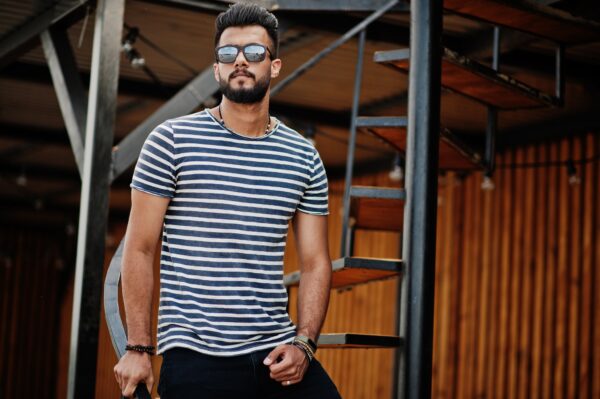 Arabian beard man model at stripped shirt